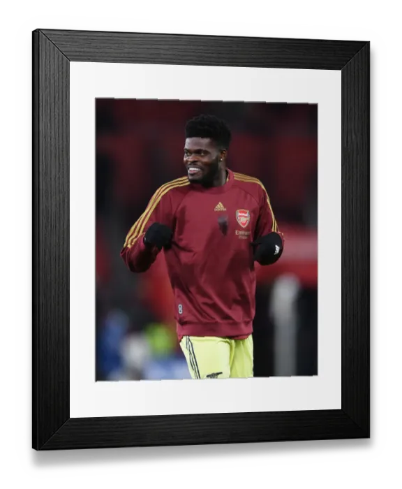 Framed Print : Thomas Partey's Intense Pre-Match Focus: Arsenal vs. Manchester United, Premier League 2020-21