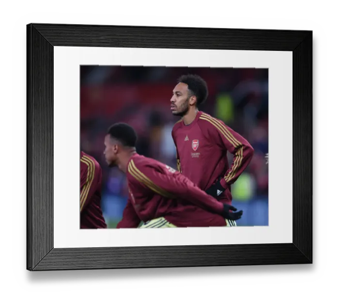 Framed Print : Arsenal's Aubameyang Gears Up for Manchester United Clash in Premier League (2020-21)