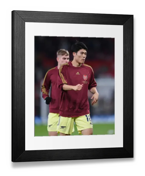 Framed Print : Arsenal's Tomiyasu Gears Up for Manchester United Clash in Premier League (December 2021) Framed Print : Arsenal's Tomiyasu Gears Up for Manchester United Clash in Premier League (December 2021)