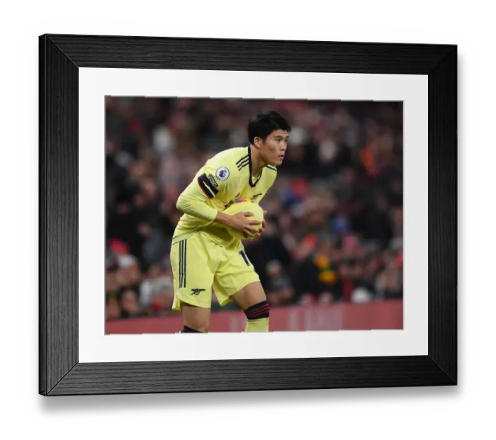 Framed Print : Arsenal's Tomiyasu Goes Head-to-Head with Manchester United: 2020-21 Premier League Clash Framed Print : Arsenal's Tomiyasu Goes Head-to-Head with Manchester United: 2020-21 Premier League Clash