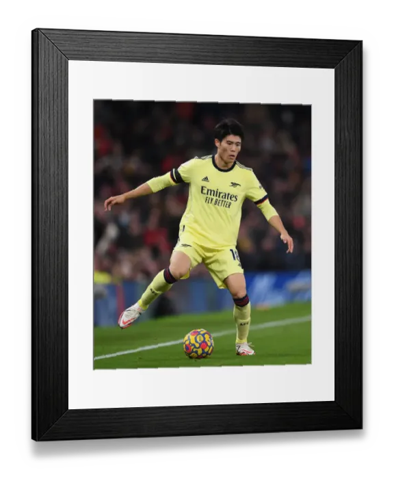 Framed Print : Arsenal's Tomiyasu Faces Off Against Manchester United at Old Trafford (Premier League 2020-21) Framed Print : Arsenal's Tomiyasu Faces Off Against Manchester United at Old Trafford (Premier League 2020-21)
