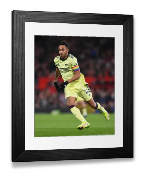 Framed Print : Arsenal's Aubameyang Faces Off Against Manchester United at Old Trafford (Manchester United vs Arsenal, Premier League 2020-21) Framed Print : Arsenal's Aubameyang Faces Off Against Manchester United at Old Trafford (Manchester United vs Arsenal, Premier League 2020-21)