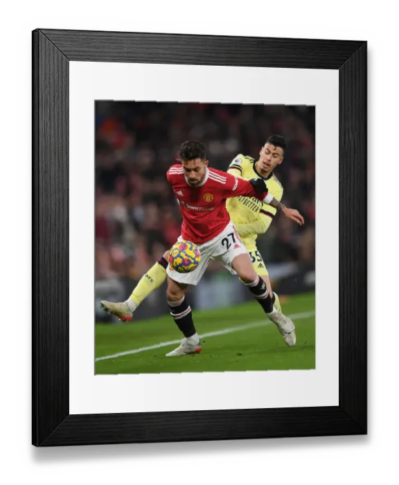 Framed Print : Martinelli vs Telles: Intense Battle at Old Trafford - Manchester United vs Arsenal, Premier League 2020-21
