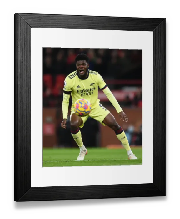 Framed Print : Thomas Partey in Action: Arsenal vs. Manchester United, Premier League 2020-21 - A Battle at Old Trafford Framed Print : Thomas Partey in Action: Arsenal vs. Manchester United, Premier League 2020-21 - A Battle at Old Trafford