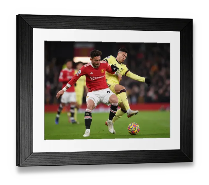 Framed Print : Clash at Old Trafford: Martinelli vs. Telles - Manchester United vs. Arsenal, Premier League 2020-21