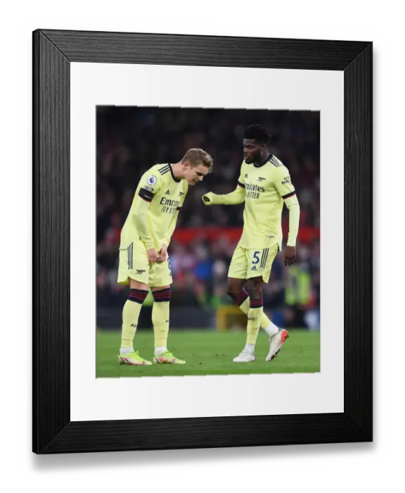 Framed Print : Thomas Partey and Martin Odegaard: Arsenal's Midfield Duo in Action against Manchester United (Premier League 2020-21) Framed Print : Thomas Partey and Martin Odegaard: Arsenal's Midfield Duo in Action against Manchester United (Premier League 2020-21)