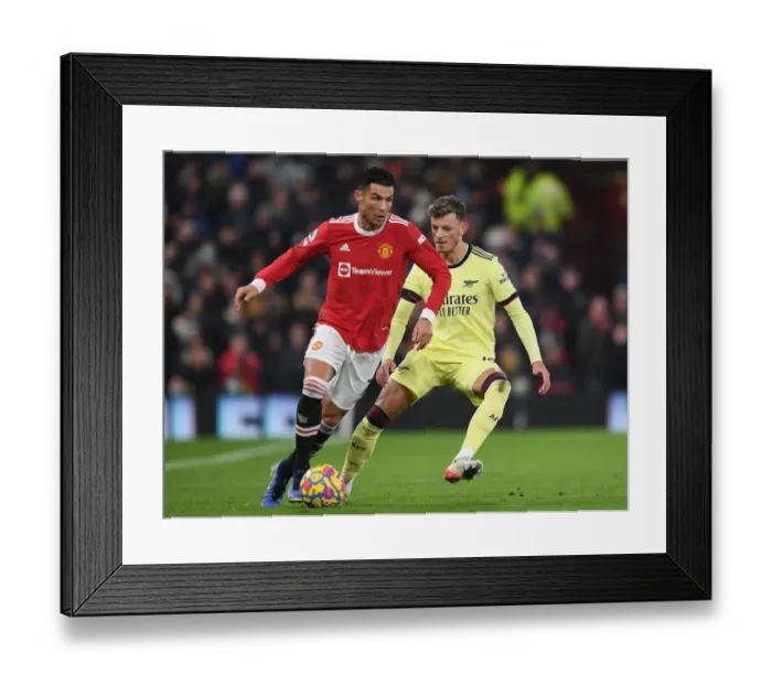 Framed Print : Clash at Old Trafford: Arsenal's Ben White Shuts Down Ronaldo's Manchester United Framed Print : Clash at Old Trafford: Arsenal's Ben White Shuts Down Ronaldo's Manchester United