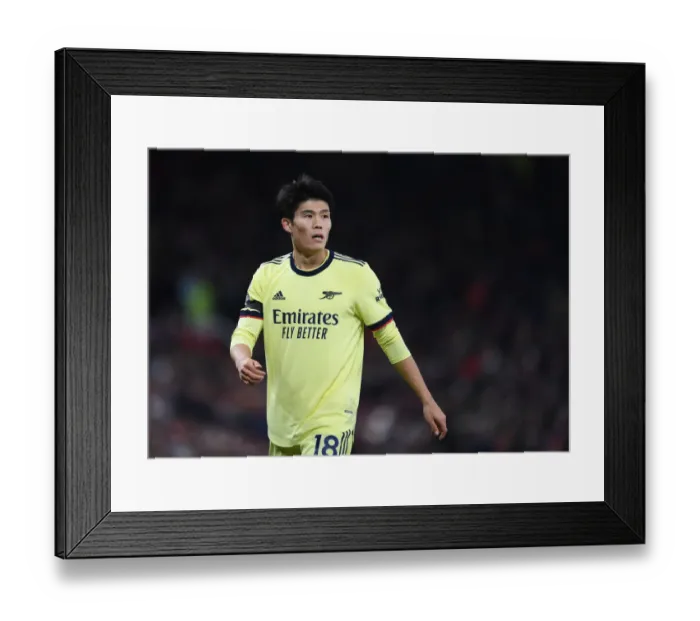 Framed Print : Arsenal's Tomiyasu Faces Manchester United in Premier League Clash Framed Print : Arsenal's Tomiyasu Faces Manchester United in Premier League Clash