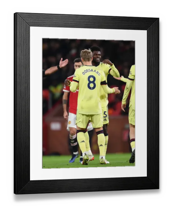 Framed Print : Arsenal's Midfield Dynamo: Thomas Partey and Martin Odegaard in Action against Manchester United (Premier League 2020-21) Framed Print : Arsenal's Midfield Dynamo: Thomas Partey and Martin Odegaard in Action against Manchester United (Premier League 2020-21)