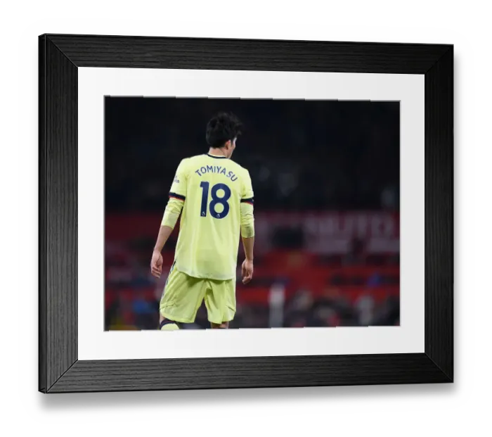 Framed Print : Tomiyasu vs Manchester United: Arsenal Star Faces Off in Premier League Clash Framed Print : Tomiyasu vs Manchester United: Arsenal Star Faces Off in Premier League Clash