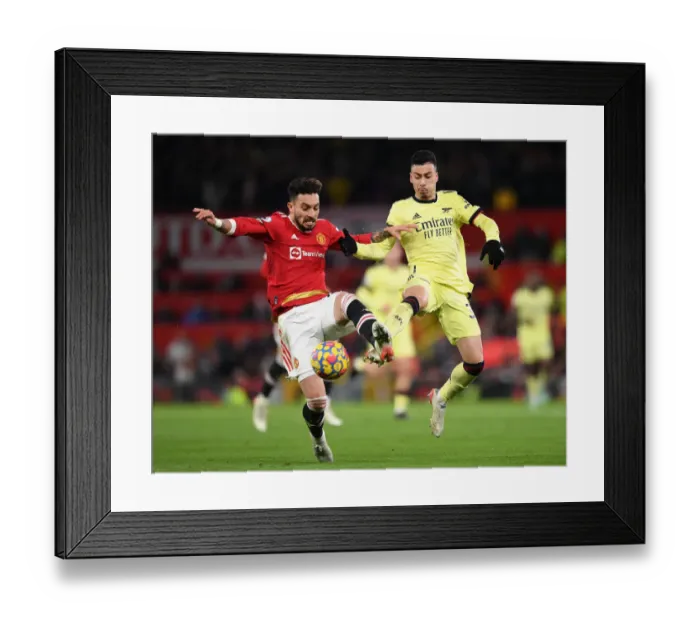 Framed Print : Martinelli vs Telles: A Premier League Battle at Old Trafford Framed Print : Martinelli vs Telles: A Premier League Battle at Old Trafford