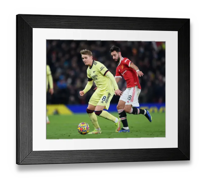 Framed Print : Clash at Old Trafford: Martin Odegaard vs Bruno Fernandes - Manchester United vs Arsenal, Premier League 2020-21 Framed Print : Clash at Old Trafford: Martin Odegaard vs Bruno Fernandes - Manchester United vs Arsenal, Premier League 2020-21