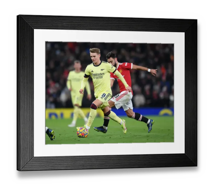 Framed Print : Arsenal's Martin Odegaard Clashes with Manchester United at Old Trafford (Premier League 2020-21)