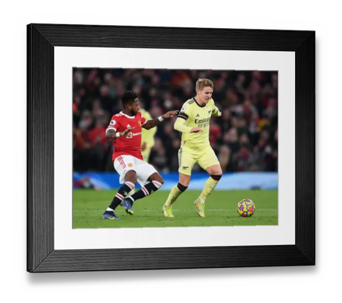 Framed Print : Clash at Old Trafford: Manchester United vs. Arsenal - Premier League Showdown