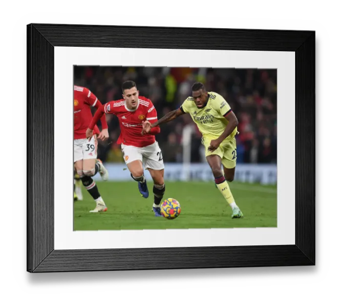Framed Print : Nuno Tavares vs Diogo Dalot: Battle at Old Trafford - Manchester United vs Arsenal, Premier League 2020-21 Framed Print : Nuno Tavares vs Diogo Dalot: Battle at Old Trafford - Manchester United vs Arsenal, Premier League 2020-21