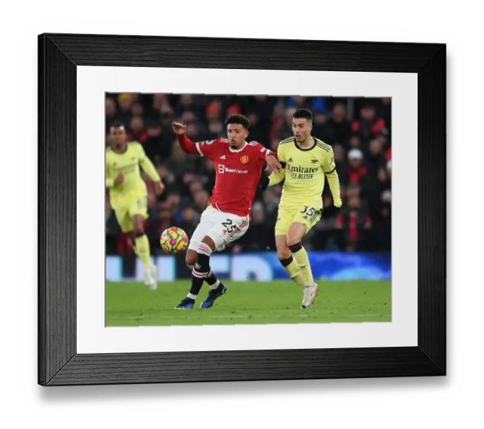 Framed Print : Martinelli Closes In: Intense Battle Between Manchester United's Sancho and Arsenal's Rising Star in Premier League Clash Framed Print : Martinelli Closes In: Intense Battle Between Manchester United's Sancho and Arsenal's Rising Star in Premier League Clash