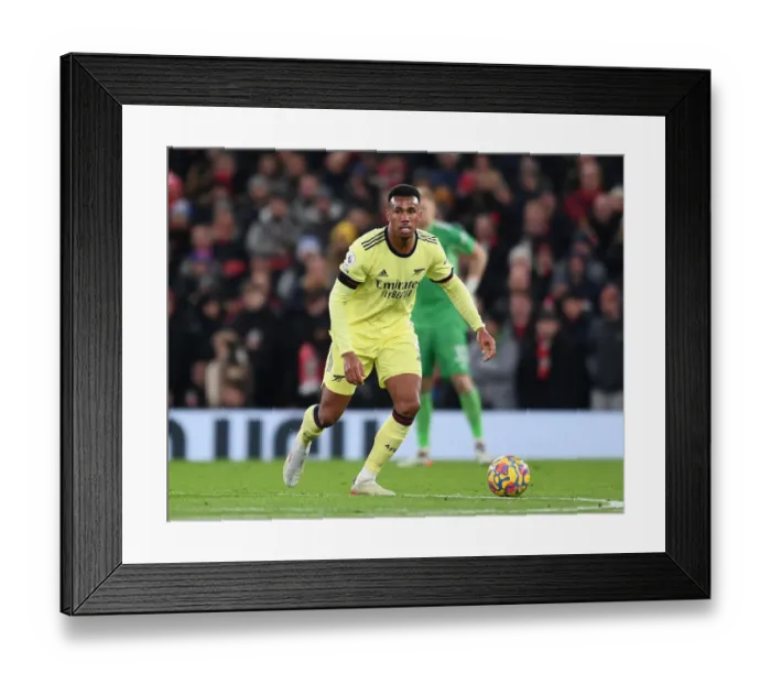 Framed Print : Gabriel Magalhaes vs Manchester United: A Premier League Battle at Old Trafford