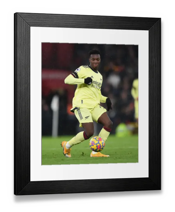 Framed Print : Nketiah vs Manchester United: Arsenal Forward Faces Off at Old Trafford (Premier League 2020-21)