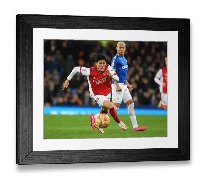 Framed Print : Arsenal's Tomiyasu in Action: Everton vs Arsenal, Premier League 2020-21