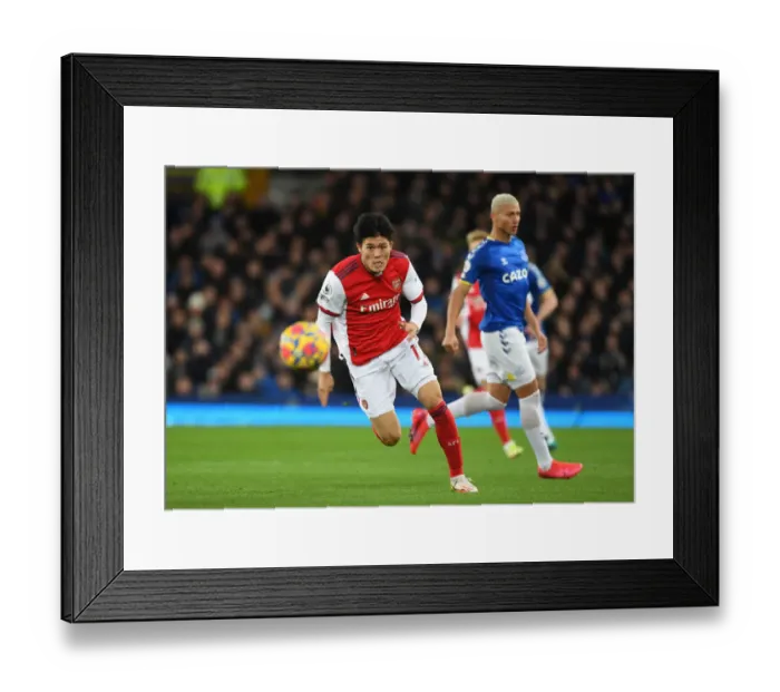 Framed Print : Arsenal's Tomiyasu in Action: Everton vs Arsenal, Premier League 2020-21
