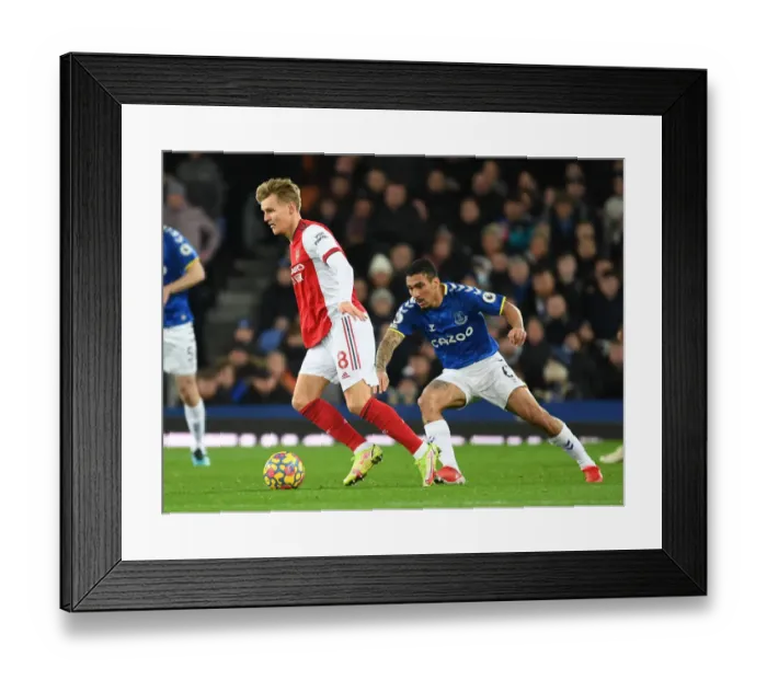 Framed Print : Odegaard vs Allan: A Premier League Battle at Goodison Park Framed Print : Odegaard vs Allan: A Premier League Battle at Goodison Park