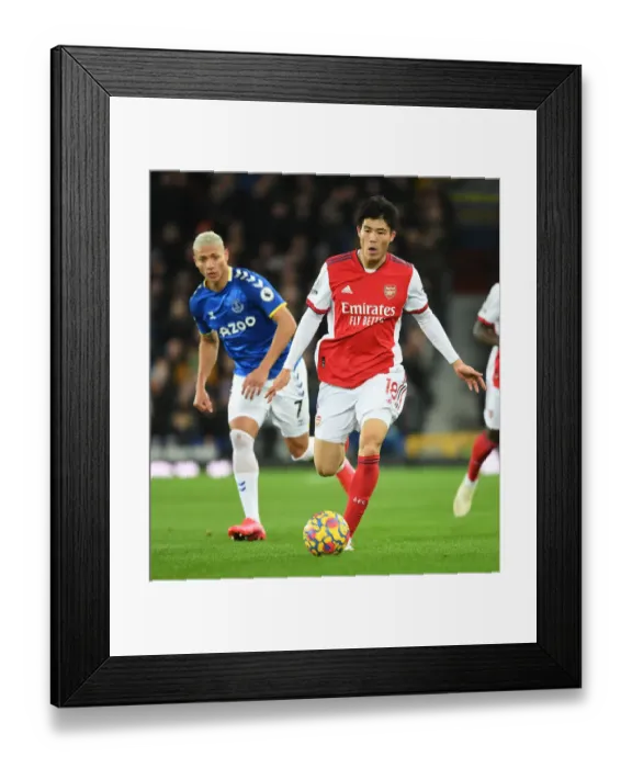 Framed Print : Arsenal's Tomiyasu in Action: Everton vs Arsenal, Premier League 2020-21