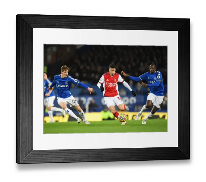Framed Print : Martinelli Faces Off Against Gordon and Doucoure: Everton vs Arsenal, Premier League 2020-21