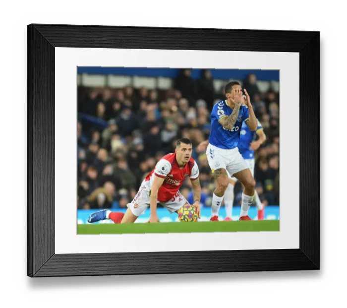 Framed Print : Intense Clash: Xhaka Fouls Allan - Everton vs. Arsenal Premier League (2020-21) Framed Print : Intense Clash: Xhaka Fouls Allan - Everton vs. Arsenal Premier League (2020-21)