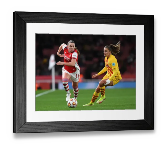 Framed Print : Arsenal vs. Barcelona: A Battle in the UEFA Women's Champions League at Emirages Stadium