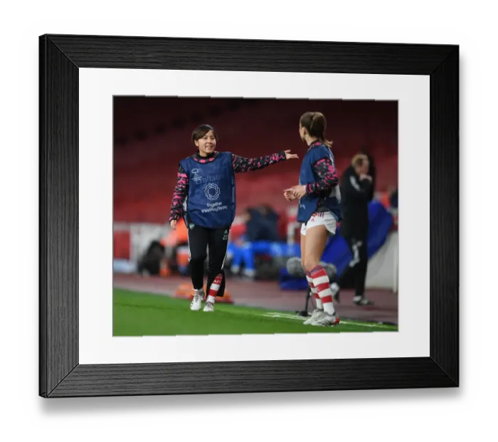 Framed Print : Arsenal Women vs. FC Barcelona: A Battle in the UEFA Women's Champions League at Emirates Stadium