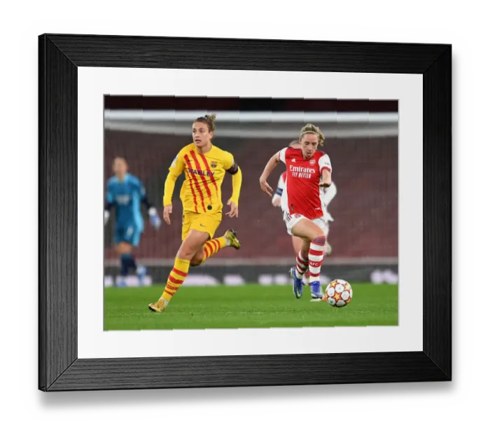 Framed Print : Arsenal vs. Barcelona: A Battle in the UEFA Women's Champions League at Emirates Stadium