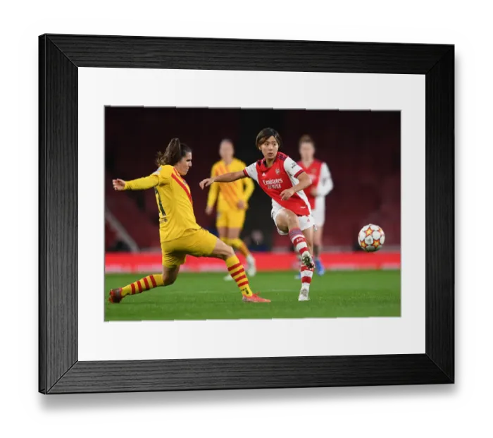 Framed Print : Arsenal WFC vs. FC Barcelona: A Battle in the UEFA Women's Champions League at Emirates Stadium