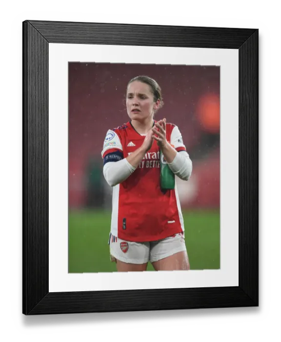 Framed Print : Arsenal Women vs. FC Barcelona: Kim Little Celebrates with Fans in UEFA Women's Champions League