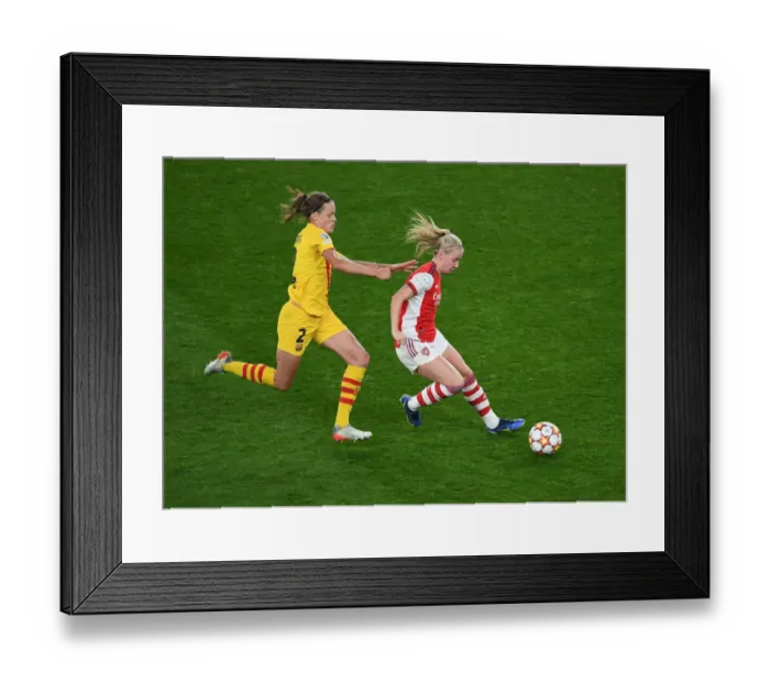 Framed Print : Champions Clash: Arsenal Women vs. Barcelona - UEFA Women's Champions League at Emirates Stadium