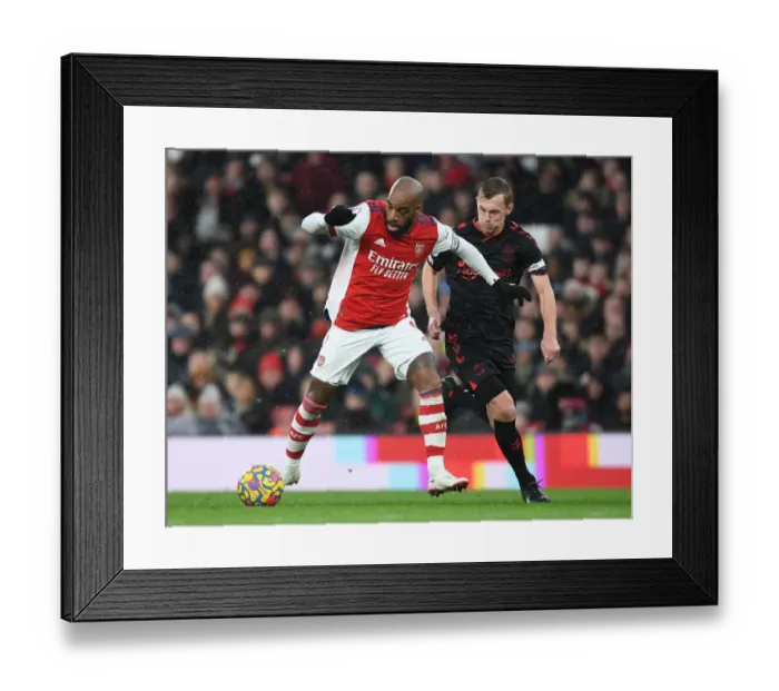Framed Print : Alexis Lacazette's Sneaky Moves: Outsmarting James Ward-Prowse in Arsenal's Victory over Southampton, Premier League 2021-22