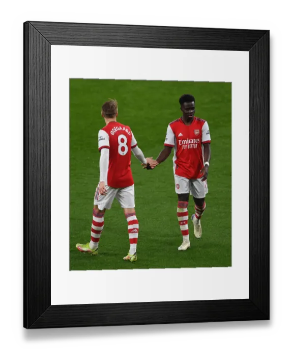 Framed Print : Arsenal's Odegaard and Saka in Action: Arsenal vs Southampton, Premier League 2021-22