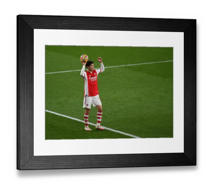 Framed Print : Arsenal's Tomiyasu in Action: Arsenal vs. Southampton (2021-22 Premier League)