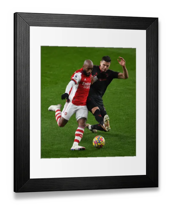 Framed Print : Lacazette vs Bednarek: A Football Battle in the Arsenal vs Southampton Premier League Clash (2021-22) Framed Print : Lacazette vs Bednarek: A Football Battle in the Arsenal vs Southampton Premier League Clash (2021-22)
