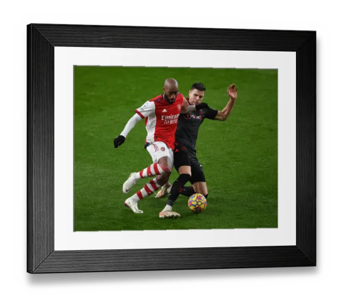 Framed Print : Arsenal vs. Southampton: Lacazette vs. Bednarek Clash in Premier League Showdown