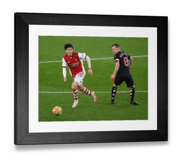 Framed Print : Arsenal vs Southampton: Tomiyasu vs Ward-Prowse Clash in Premier League Showdown Framed Print : Arsenal vs Southampton: Tomiyasu vs Ward-Prowse Clash in Premier League Showdown