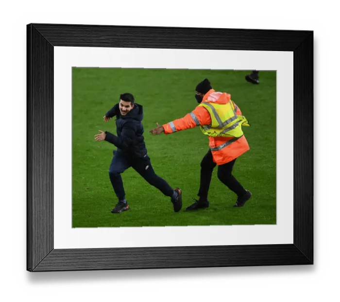 Framed Print : Arsenal vs Southampton: Fan Evades Steward Amidst Post-Match Tension