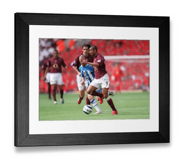 Framed Print : Arsenal's Victory: Ashley Cole vs. Wigan Athletic in the FA Premiership, Highbury, 2006