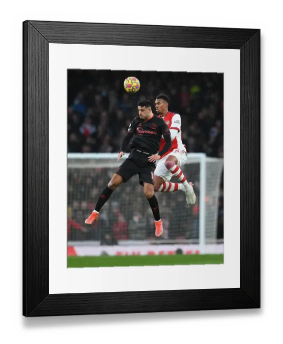 Framed Print : Arsenal vs Southampton: Gabriel Magalhaes Clashes with Armando Broja in Intense Premier League Showdown Framed Print : Arsenal vs Southampton: Gabriel Magalhaes Clashes with Armando Broja in Intense Premier League Showdown