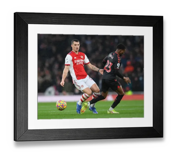 Framed Print : Arsenal vs Southampton: Xhaka vs Tella Clash in Premier League Showdown Framed Print : Arsenal vs Southampton: Xhaka vs Tella Clash in Premier League Showdown