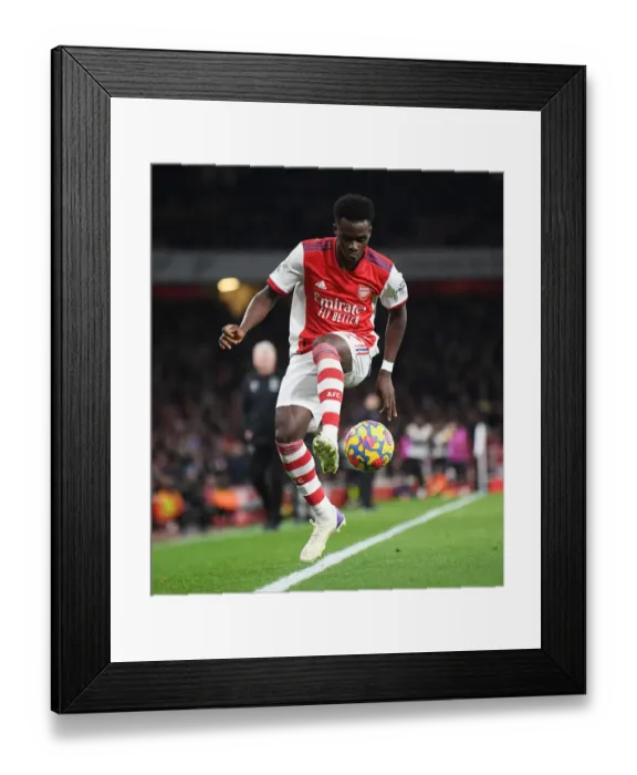 Framed Print : Arsenal's Bukayo Saka in Action: Arsenal vs. West Ham United, Premier League 2021-22 Framed Print : Arsenal's Bukayo Saka in Action: Arsenal vs. West Ham United, Premier League 2021-22