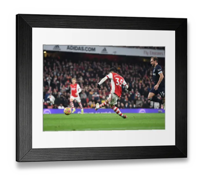 Framed Print : Martinelli Scores First: Arsenal's Triumph Over West Ham United in Premier League 2021-22 Framed Print : Martinelli Scores First: Arsenal's Triumph Over West Ham United in Premier League 2021-22