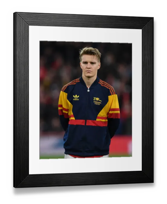 Framed Print : Arsenal's Martin Odegaard Prepares for Arsenal v West Ham United in the Premier League Framed Print : Arsenal's Martin Odegaard Prepares for Arsenal v West Ham United in the Premier League
