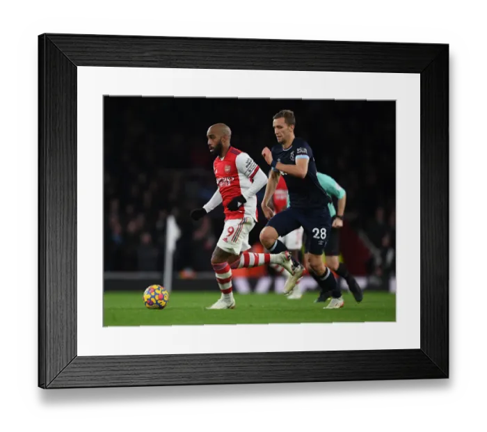 Framed Print : Lacazette's Slick Moves: Outsmarting Soucek in Arsenal's Premier League Victory Framed Print : Lacazette's Slick Moves: Outsmarting Soucek in Arsenal's Premier League Victory