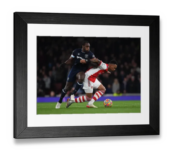 Framed Print : Gabriel vs. Antonio: A Premier League Battle at Emirates Stadium Framed Print : Gabriel vs. Antonio: A Premier League Battle at Emirates Stadium