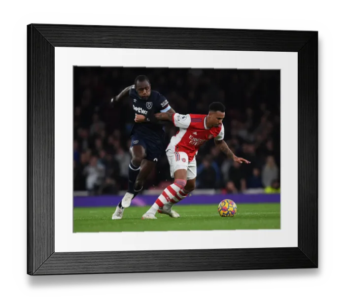 Framed Print : Gabriel vs. Antonio: A Premier League Battle at Emirates Stadium Framed Print : Gabriel vs. Antonio: A Premier League Battle at Emirates Stadium